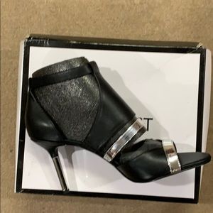 Never worn still in the box